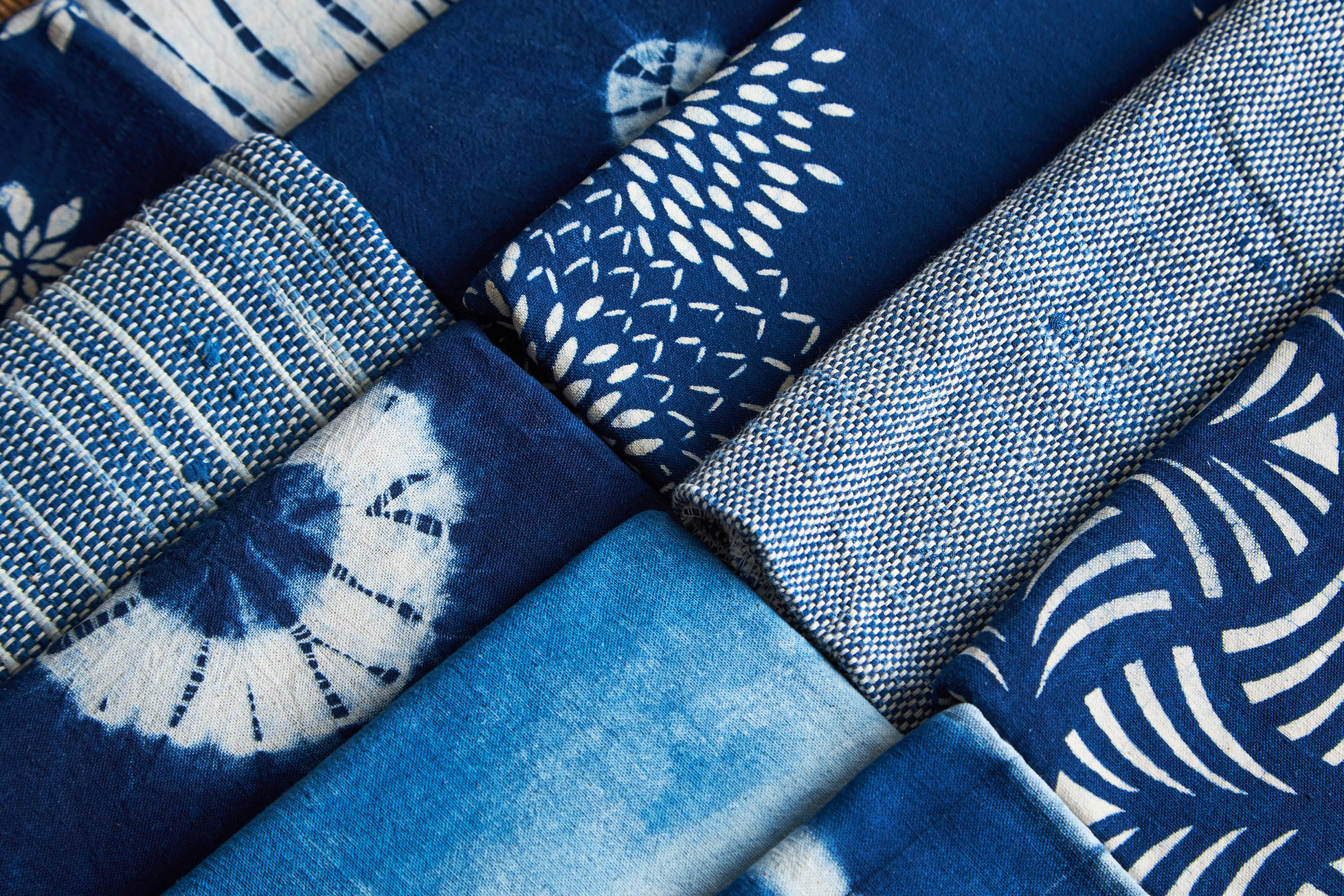Blue textiles with a range of woven and printed patterns
