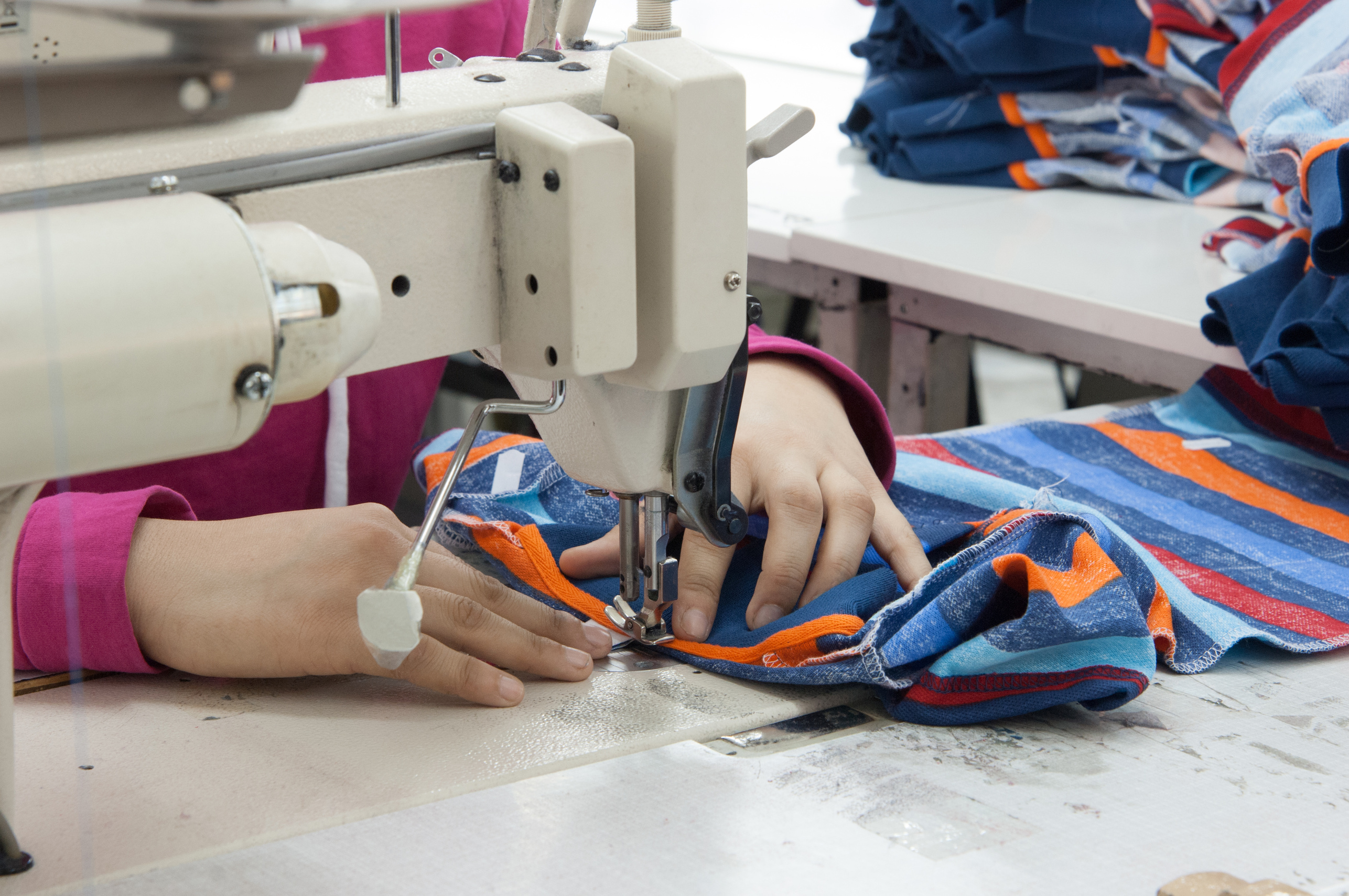 Garment stitching on an industrial sewing machine